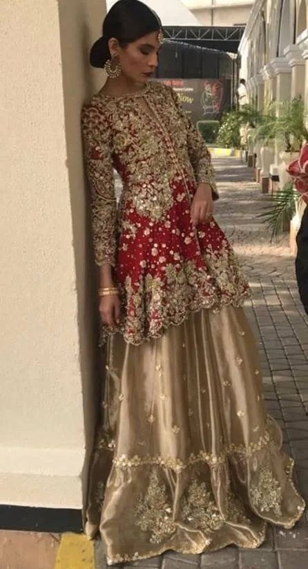 Beautiful bridal lahnga in maroon red and golden color Model # B 911